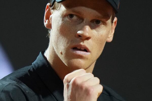 Italy's Jannik Sinner celebrates a winning point during a round of sixteen match against Argentina's Francisco Cerundolo at the Italian Open tennis tournament in Rome, Tuesday, May 13, 2025. (AP Photo/Andrew Medichini)