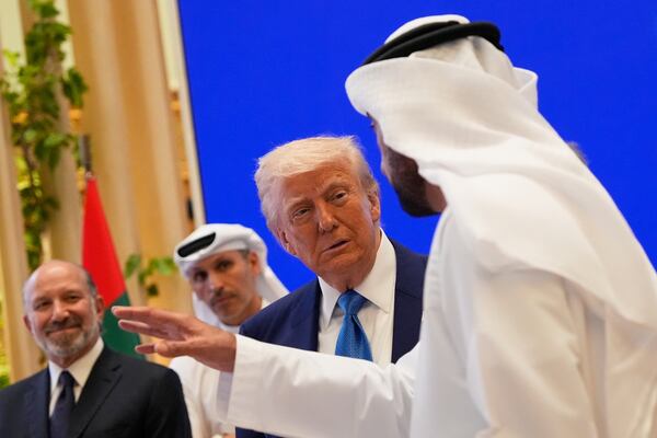 President Donald Trump attends a business meeting at Qasr Al Watan, Friday, May 16, 2025, in Abu Dhabi, United Arab Emirates. (AP Photo/Alex Brandon)