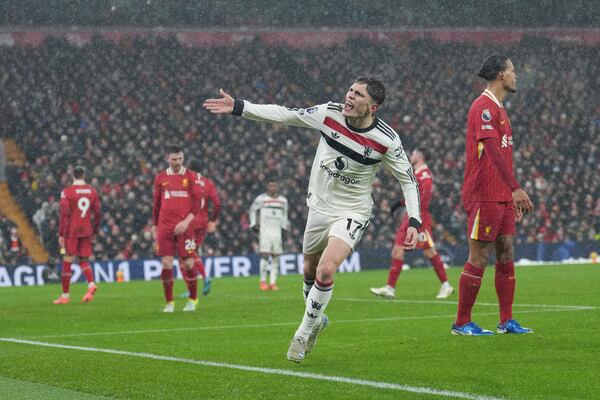 Manchester United's Alejandro Garnacho gestures during the English Premier League soccer match against Liverpool at the Anfield stadium in Liverpool, England, Sunday, Jan. 5, 2025. (AP Photo/Jon Super)