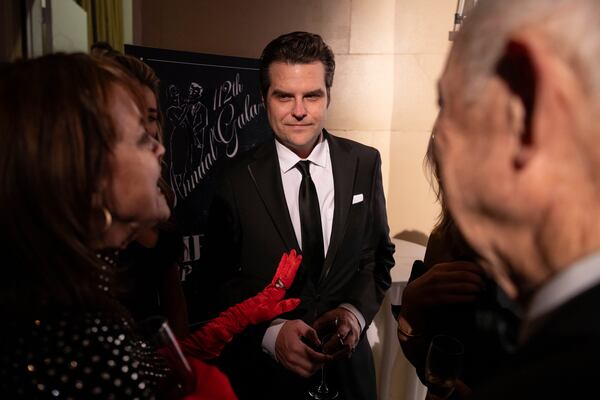 Former Rep. Matt Gaetz, R-Fla., center, attends the cocktail hour of New York Young Republican Club's annual gala at Cipriani Wall Street, Sunday, Dec. 15, 2024, in New York. (AP Photo/Yuki Iwamura)