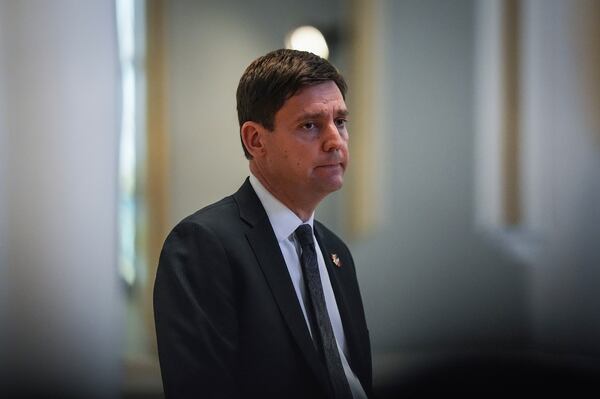 B.C. Premier David Eby pauses while speaking after mass at Holy Rosary Cathedral on a provincial day of mourning for the victims of the vehicle-ramming attack at the Filipino community's Lapu Lapu Day festival last week, in Vancouver, on Friday, May 2, 2025. (Darryl Dyck/The Canadian Press via AP)