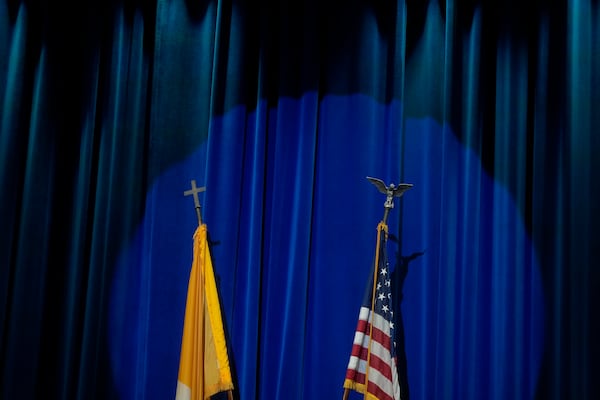 The U.S. and Vatican flags are displayed at the North American College in Rome, Friday, May 9, 2025, for a press conference with U.S. cardinals—one day after U.S. Cardinal Robert Francis Prevost was elected Pope Leo XIV. (AP Photo/Gregorio Borgia)