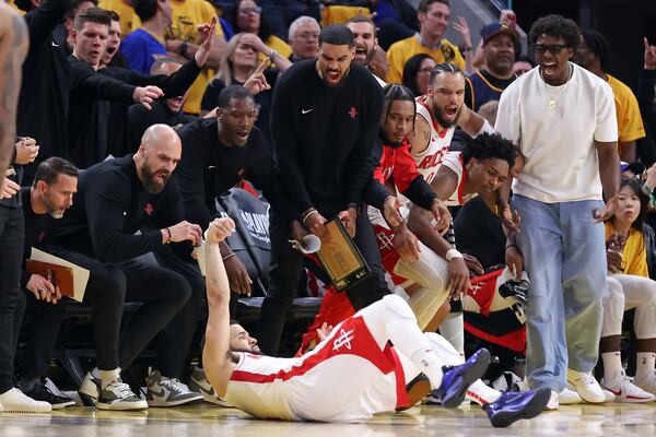 Houston Rockets' bench celebrates Fred VanVleet's three-pointer and a foul in fourth quarter of Game 6 of an NBA basketball first-round playoff series Friday, May 2, 2025, in San Francisco. (Scott Strazzante/San Francisco Chronicle via AP)