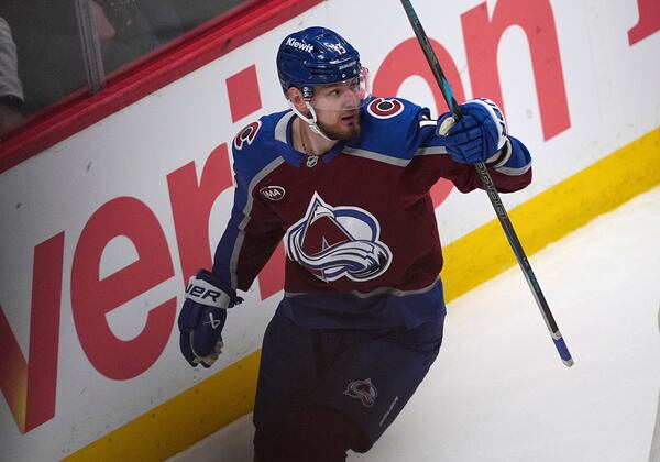 Colorado Avalanche right wing Valeri Nichushkin reacts after scoring against the Dallas Stars in the first period of Game 6 of an NHL hockey first-round playoff series Thursday, May 1, 2025, in Denver. (AP Photo/David Zalubowski)