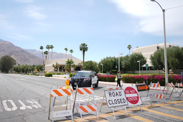 A road is closed near the site of an explosion Saturday, May 17, 2025, in Palm Springs, Calif. (AP Photo/Eric Thayer)