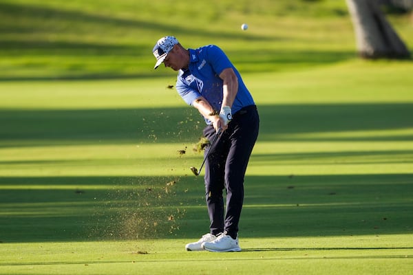 Patrick Fishburn hits from the ninth fairway during the second round of the Sony Open golf event, Friday, Jan. 10, 2025, at Waialae Country Club in Honolulu. (AP Photo/Matt York)