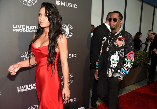 FILE - Cassie Ventura, left, and Sean "Diddy" Combs, arrive at the Los Angeles premiere of "Can't Stop, Won't Stop: A Bad Boy Story" at the Writers Guild Theater, June 21, 2017, in Beverly Hills, Calif. (Photo by Chris Pizzello/Invision/AP File)