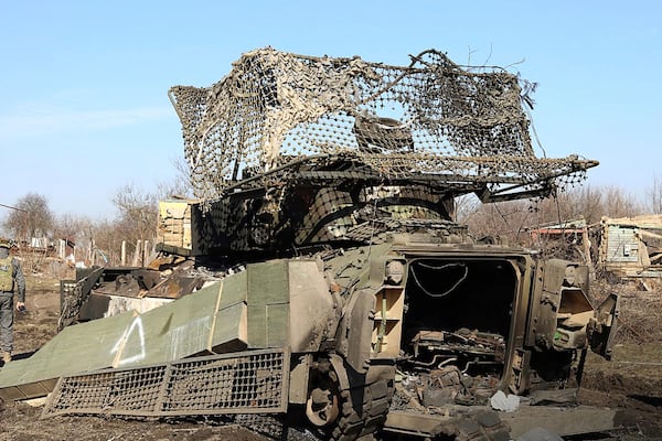 In this photo distributed by Russian Defense Ministry Press Service on Saturday, March 15, 2025, a destroyed Ukrainian Army M2A Bradly armored personal carrier is seen at Cherkasskoe Porechnoe and Pravda in Sudzha district of the Kursk region of Russia after it was taken over by Russian troops. (Russian Defense Ministry Press Service via AP)