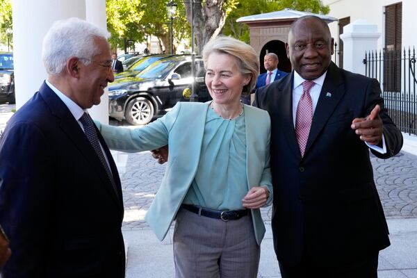 South Africa's President Cyril Ramaphosa, right, welcomes Ursula von der Leyen, the European Commission President, centre, and Antonio Costa, European Union Council President, left, ahead of the eighth EU-South Africa summit in Cape Town, South Africa, Thursday, March 13, 2025. (AP Photo/Nardus Engelbrecht)