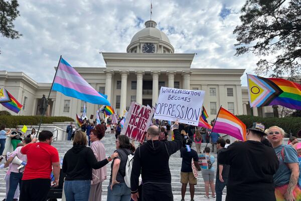 Demonstrators march to the Alabama Capitol in Montgomery, Ala., on Feb. 5, 2025 to protest bills that would impact transgender people. (AP Photo/Kim Chandler)