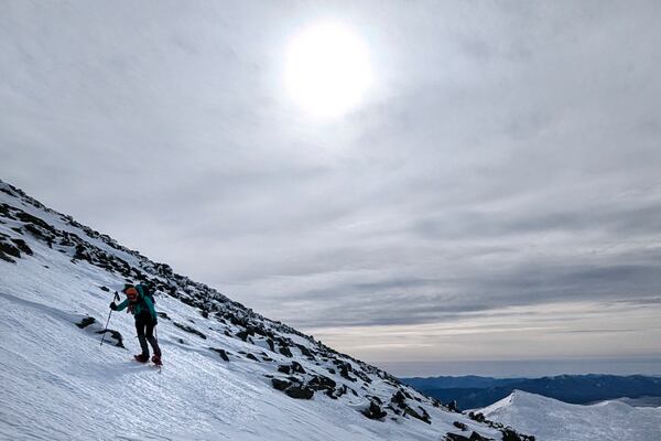 In this photograph provided by Kathyrn McKee, fellow hiker Beata LeLacheur treks along the Westside trail, hours before needing to be rescued, on Mount Washington, N. H., Sunday, Feb. 2, 2025. (Kathyrn McKee photo via AP)