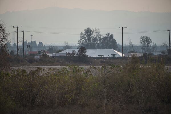 A large tent is erected at Lario Park, used by the U.S. Environmental Protection Agency (EPA) temporarily for processing hazardous materials from the Eaton Fire, in Irwindale, Calif., Friday, Jan. 31, 2025. (AP Photo/Damian Dovarganes)