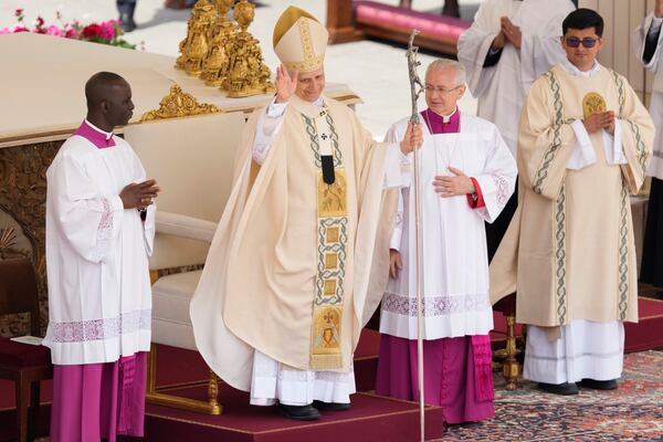 Pope Leo XIV waves at the end of a Mass for the formal inauguration of his pontificate, in St. Peter's Square, at the Vatican, Sunday, May 18, 2025.(AP Photo/Gregorio Borgia)