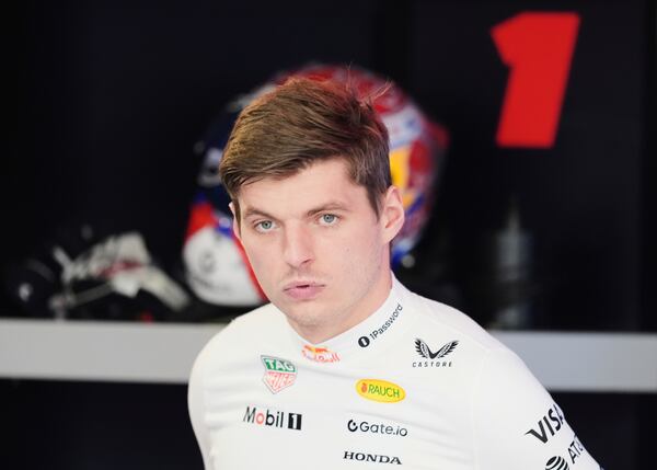 Red Bull driver Max Verstappen of the Netherlands stands in the pits during a practice session for the Formula One Miami Grand Prix auto race, Friday, May 2, 2025, in Miami Gardens, Fla. (AP Photo/Rebecca Blackwell)