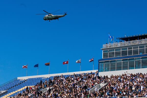 Marine Two, with Vice President JD Vance aboard, flies over the U.S. Naval Academy in Annapolis, Md., during the procession of graduates in the U.S. Naval Academy's graduation and commissioning ceremony, Friday, May 23, 2025. (AP Photo/KT Kanazawich)