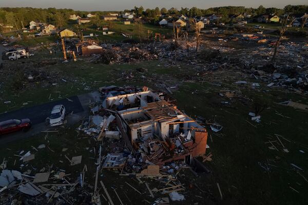 Destroyed homes are seen after a severe storm passed through the area, Saturday, May 17, 2025, in London, Ky. (AP Photo/Carolyn Kaster)