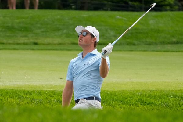 Ben Griffin watches his shot from the rough on the 10th fairway during the first round of the Memorial golf tournament Thursday, May 29, 2025, in Dublin, Ohio. (AP Photo/Sue Ogrocki)
