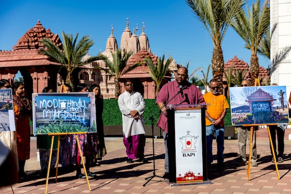 Mehul Patel, a volunteer with BAPS Shri Swaminarayan Mandir, a Hindu temple in Chino Hills, Calif., speaks during a rally for unity and peace on Sunday, March 9, 2025, after the temple was desecrated with graffiti March 7, 2025. (BAPS Swaminarayan Sanstha via AP)