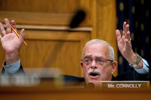 FILE - House Foreign Affairs Committee member Rep. Gerald Connolly, D-Va. questions U.S. Ambassador to the UN Nikki Haley, on Capitol Hill in Washington, June 28, 2017. Connolly, a Democratic congressman and fixture of Virginia politics, has died at 75. (AP Photo/Andrew Harnik, File)