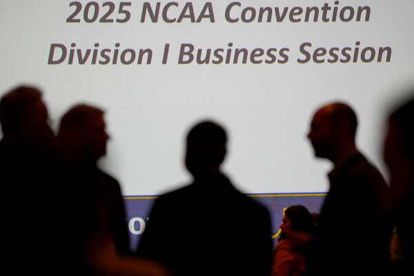 Delegates gather for a meeting of the Division I Business Session at the NCAA annual convention Wednesday, Jan. 15, 2025, in Nashville, Tenn. (AP Photo/George Walker IV)