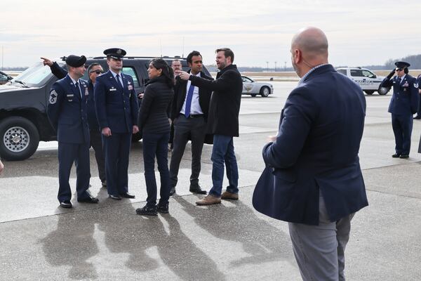 Vice President JD Vance, center, speaks with Vivek Ramaswamy as Vance and his wife Usha Vance arrive at Youngstown Air Reserve Station in Vienna, Ohio, en route to East Palestine, Ohio, Monday, Feb. 3, 2025. (Rebecca Droke/Pool Photo via AP