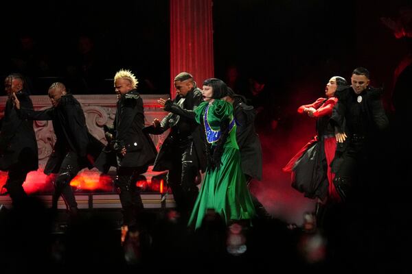 Lady Gaga, center, performs during her free concert on Copacabana Beach in Rio de Janeiro, Saturday, May 3, 2025. (AP Photo/Silvia Izquierdo)