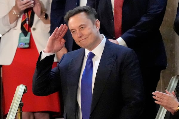 Elon Musk salutes as President Donald Trump addresses a joint session of Congress at the Capitol in Washington, Tuesday, March 4, 2025. (AP Photo/Alex Brandon)