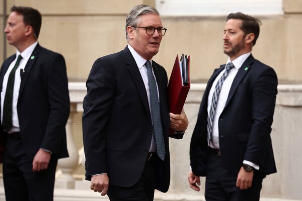 Britain's Prime Minister Keir Starmer, center, arrives to attend the UK-EU Summit at Lancaster House, in London, Monday, May 19, 2025. (Henry Nicholls/Pool Photo via AP)