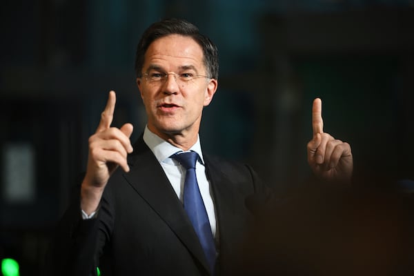 NATO Secretary General Mark Rutte speaks with the media as he arrives for a meeting of NATO defense ministers at NATO headquarters in Brussels, Thursday, Feb. 13, 2025. (AP Photo/Harry Nakos)