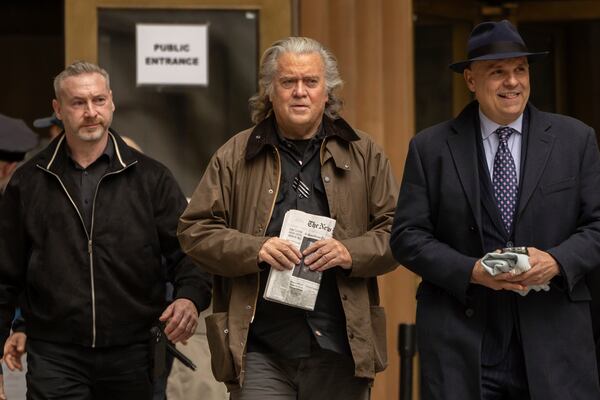 Steve Bannon exits court in New York, Tuesday, Feb. 11, 2025. (AP Photo/Yuki Iwamura)