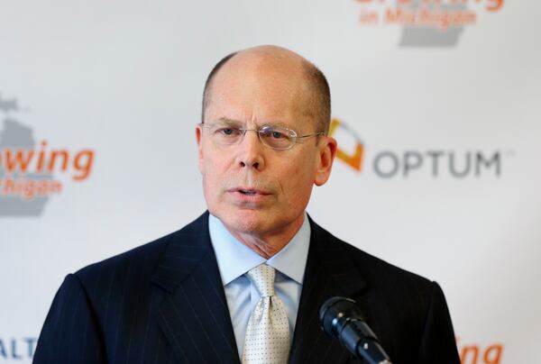 FILE - In this April 29, 2014, file photo, Stephen Hemsley, president and CEO of UnitedHealth Group, speaks at a news conference, in Southfield, Mich. (AP Photo/File)