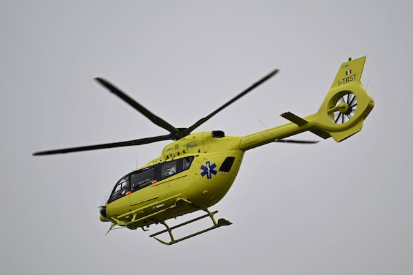 An ambulance helicopter takes off from the elementary school following a knife attack in Zagreb, Croatia, Friday, Dec. 20, 2024. (AP Photo/Damir Krajac)