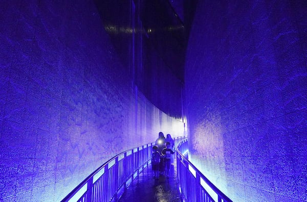 Visitors walks at the Tsunami Museum in Banda Aceh, Aceh province, Indonesia, Saturday, Dec 14, Dec. 15, 2024. (AP Photo/Achmad Ibrahim)