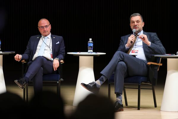 Minister of Foreign Affairs of Bosnia and Herzegovina Elmedin Konakovic, right, speaks next to Minister of Foreign and European Affairs of Croatia Gordan Grlic-Radman during a panel discussion at the NATO Parliamentary Assembly in Dayton, Ohio, Friday, May 23, 2025. (AP Photo/Paul Vernon)