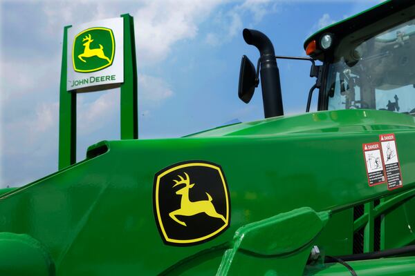 FILE - John Deere equipment is on display at the Farm Progress Show in Decatur, Ill., Aug. 31, 2015. (AP Photo/Seth Perlman, File)