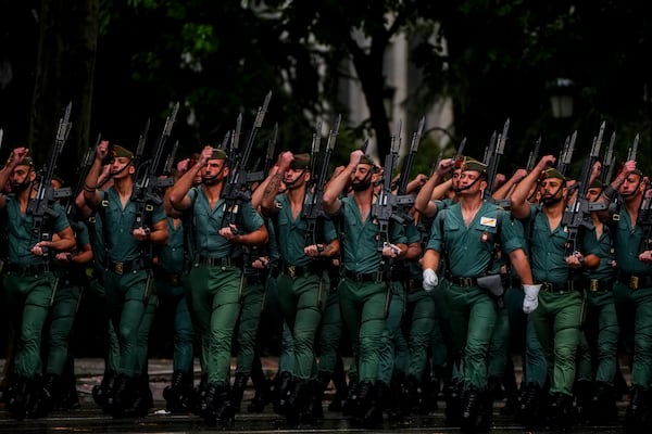 FILE - Members of La Legion, an elite unit of the Spanish Army, march to celebrate 'Dia de la Hispanidad' or Hispanic Day, in Madrid, Spain, Oct. 12, 2024. (AP Photo/Manu Fernandez, File)