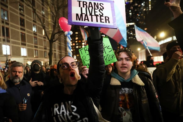 Protesters march during a rally demanding that NYU Langone commit to providing gender-affirming care for transgender youth following an executive order by President Donald Trump aimed at cutting federal funding, Monday, Feb. 3, 2025, in New York. (AP Photo/Heather Khalifa)