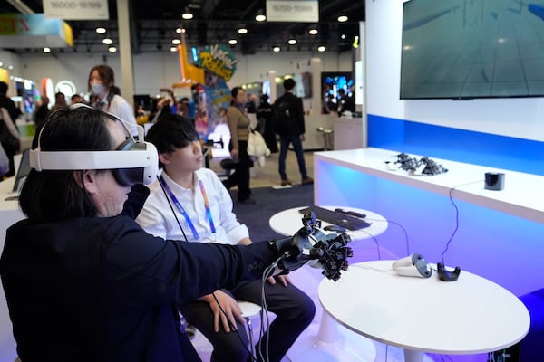 A Kurimoto MRF glove is shown at a Kurimoto booth during the CES tech show Tuesday, Jan. 7, 2025, in Las Vegas. (AP Photo/Abbie Parr)