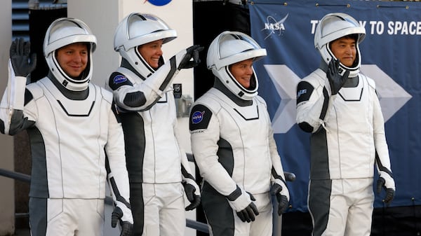 Crew 10, from left, cosmonaut Kirill Peskov, astronaut Nichole Ayers, astronaut Anne McClain and astronaut Anne McClain leave the Operations and Checkout building before heading to Launch Pad 39-A at the Kennedy Space Center in Cape Canaveral, Fla., for a mission to the International Space Station, Wednesday, March 12, 2025. (AP Photo/Terry Renna)