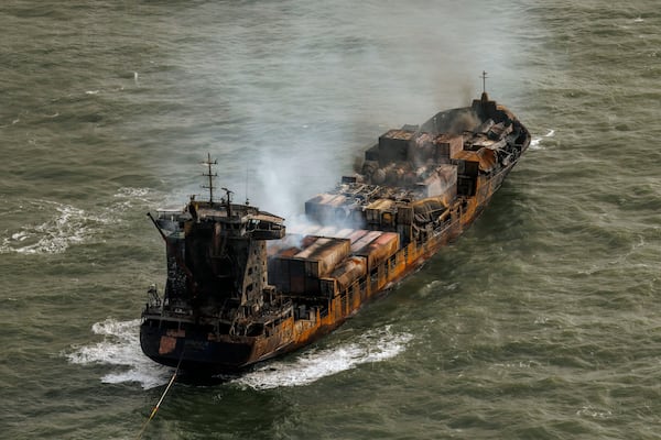 Smoke billows from the MV Solong cargo ship in the North Sea, off the Yorkshire coast in England, Tuesday, March 11, 2025. (Dan Kitwood/Pool Photo via AP)