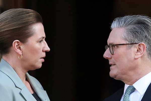 Britain's Prime Minister Keir Starmer, right, welcomes Denmark's Prime Minister Mette Frederiksen to the European leaders' summit to discuss Ukraine, at Lancaster House, London, Sunday March 2, 2025. (Toby Melville/Pool via AP)