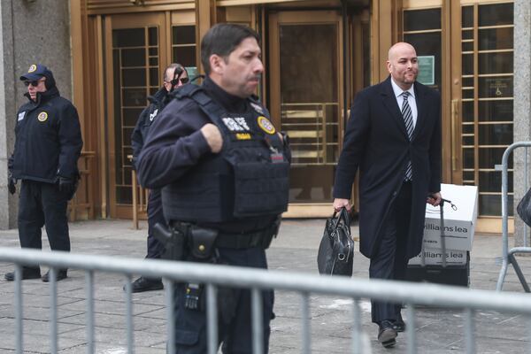 Joseph Cammarata, attorney for Rudy Giuliani, exits federal court, Thursday, Jan. 16, 2025, in New York. (AP Photo/Heather Khalifa)