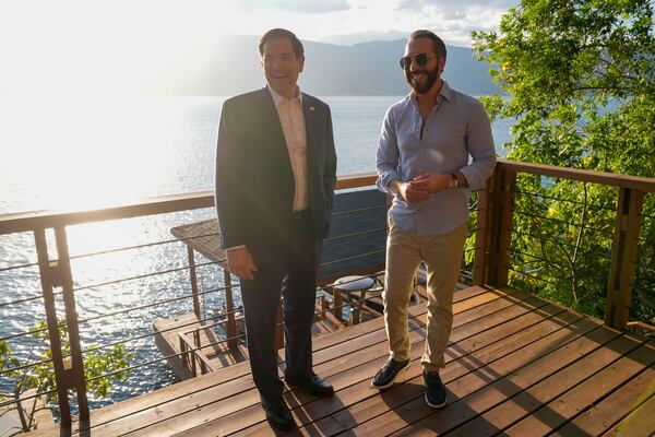 U.S. Secretary of State Marco Rubio meets with President Nayib Bukele at his residence at Lake Coatepeque in El Salvador, Monday, Feb. 3, 2025. (AP Photo/Mark Schiefelbein, Pool)