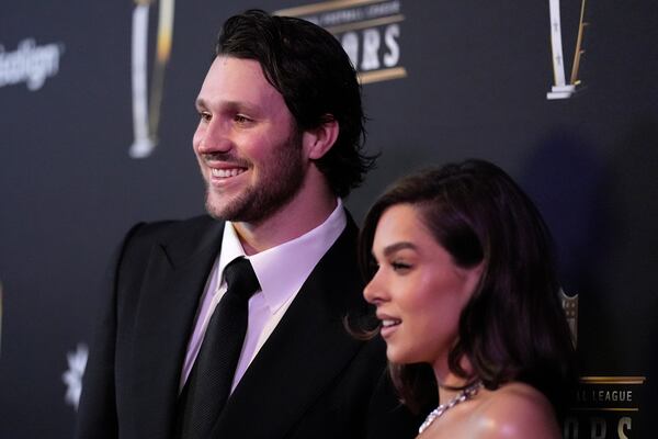 Josh Allen, of the Buffalo Bills, and his fiancé, Hailee Steinfeld, pose on the red carpet at the NFL Honors award show ahead of the Super Bowl 59 football game, Thursday, Feb. 6, 2025, in New Orleans. (AP Photo/Brynn Anderson)