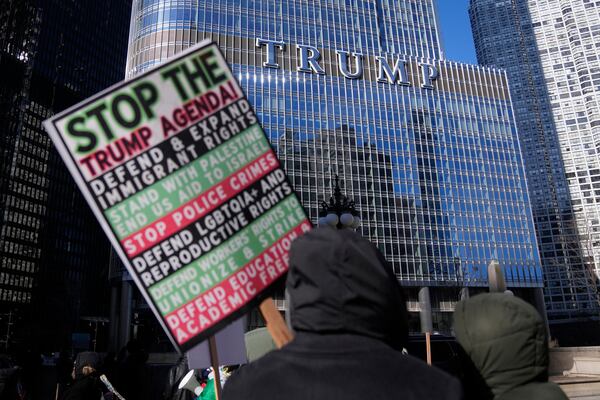 Anti-Trump protesters march to Trump Tower as they rally for a number of issues, including immigrant rights, the Israel-Hamas war, women's reproductive rights, racial equality and others, on the day of President Trump's Inauguration, Monday, Jan. 20, 2025, in Chicago. (AP Photo/Erin Hooley)