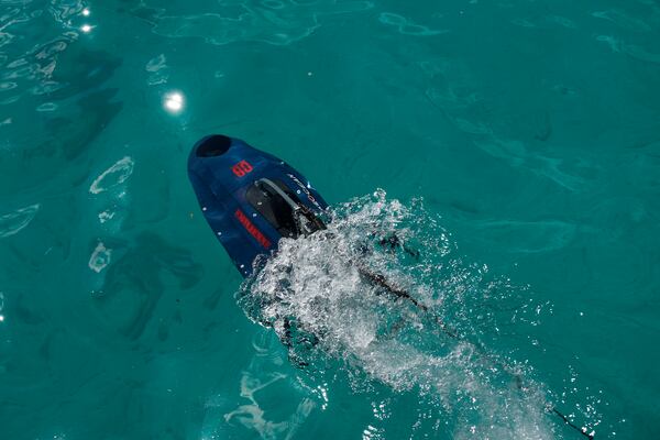 An underwater drone passes inside the seawater during a demonstration at a Marina in the southern resort of Ayia Napa, Cyprus, Monday, Feb. 24, 2025. (AP Photo/Petros Karadjias)