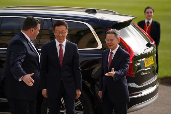 FILE - Chinese Vice Premier Han Zheng, center, arrives at Buckingham Palace in London on May 5, 2023, for a reception hosted by Britain's King Charles III, for overseas guests attending his coronation. (Jacob King, Pool via AP, File)