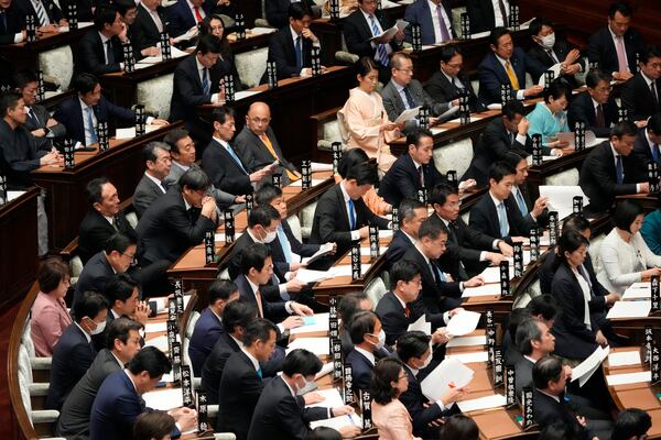 Lawmakers listen as Japan's Prime Minister Shigeru Ishiba delivers a policy speech marking the start of this year's parliamentary session in Tokyo, Friday, Jan. 24, 2025. (AP Photo/Eugene Hoshiko)