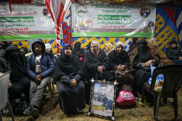 Families of Palestinian prisoners to be released from Israeli prison wait for their arrival in Khan Younis, southern Gaza Strip, late Wednesday Feb. 27, 2025. (AP Photo/Jehad Alshrafi)