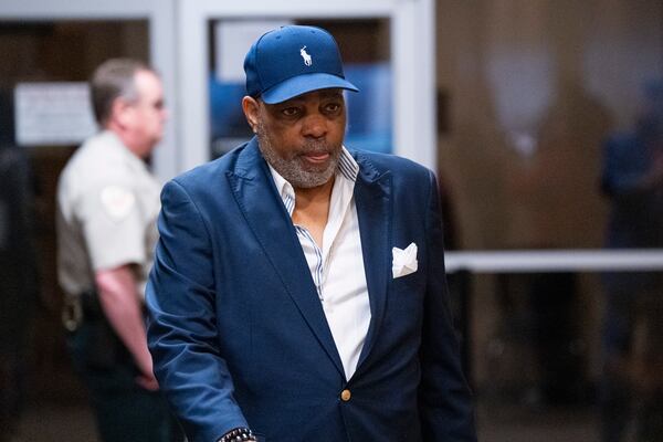 Rodney Wells, the stepfather of Tyre Nichols, prepares to leave the courthouse after the three former Memphis Police Department officers on trial were found not guilty on all charges by the jury on the ninth day of the trial for the death of Nichols in Memphis, Tenn., on Wednesday, May 7, 2025. (Chris Day/Commercial Appeal/USA Today Network via AP, Pool)